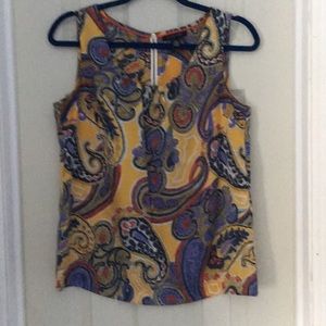 Sleeveless top perfectly matched with a blazer